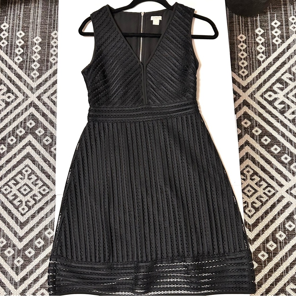 J Crew Black v neck dress, fit and flare.
Size 2 
Zipper back
Sheer top layer